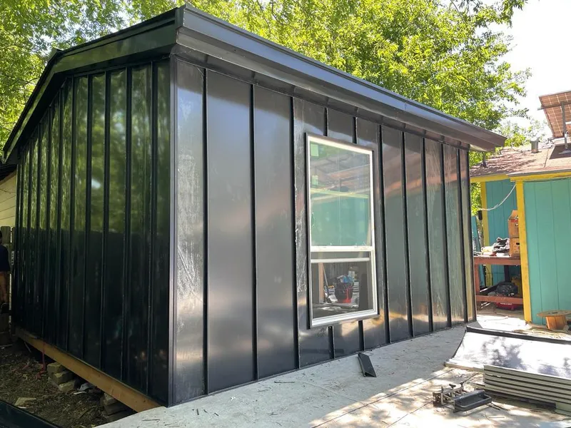 Black standing seam metal wall panels for Metal Roof Installation in Fond du Lac