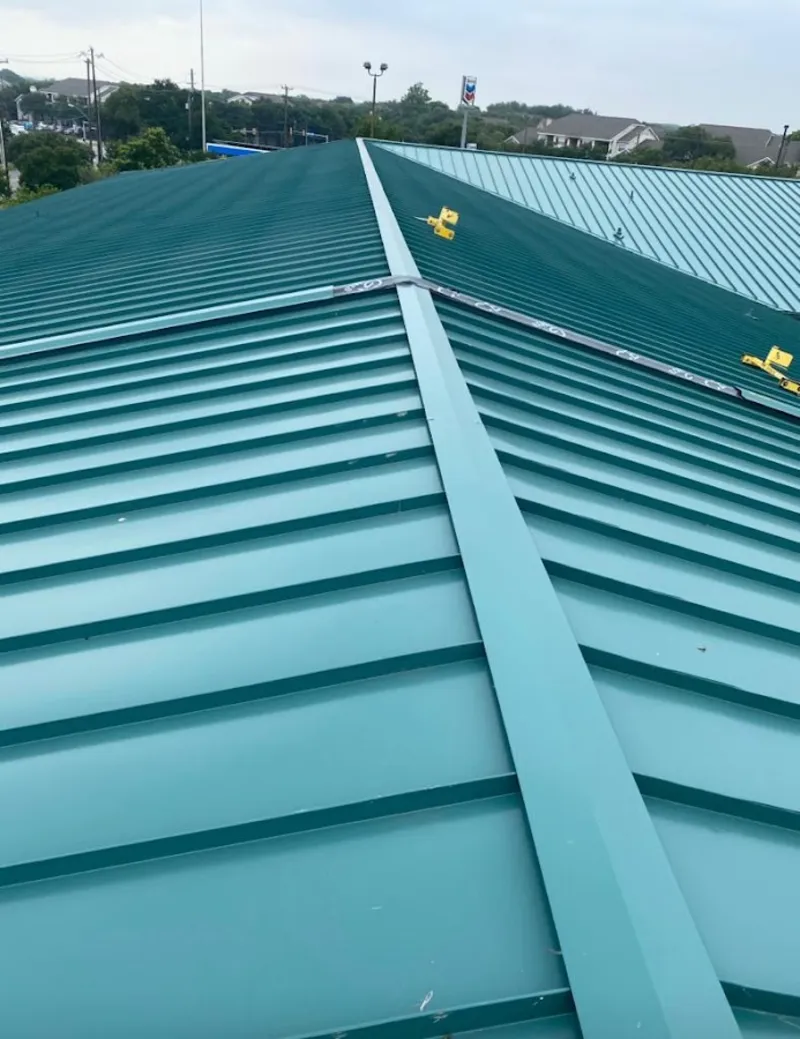 Green commercial metal roof ridge and valley for Metal Roof Repair in Fond du Lac