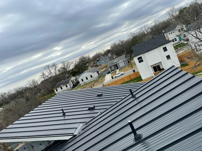 Standing seam metal roof panels with vents for Skylight Repair in Fond du Lac